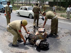 A scooter caught fire after an accident on the GT Road in Ambala Cantt
