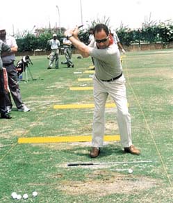 Golf teacher Donato Di Ponziano of Italy displays a swing shot 
