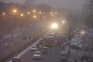 A thick haze of acrid smoke hangs in the air