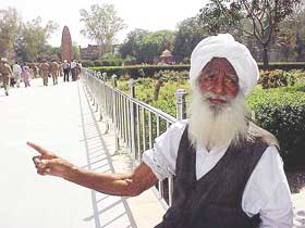 Lone survivor of the Jallianwala Bagh massacre Shingara Singh, 107, in front of the monument at Jallianwala Bagh on Wednesday.