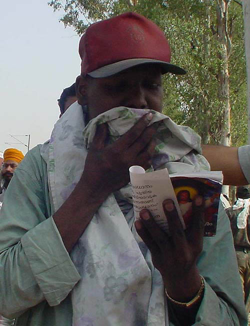 Army man Saji M.K., who lost his wife and two children, draws solace from the Bible. 