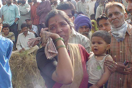A grieving Anjali Binke in desperate search for her husband and other relatives after the incident. 