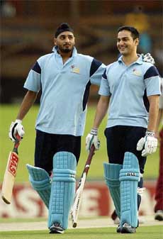 Harbhajan Singh and Arbaaz Khan during the match