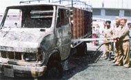 Firefighters put out the fire in the truck