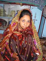 Twentythree-year-old Ameena wearing bridal wear before her marriage