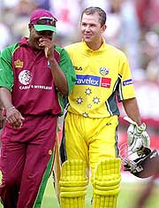 West Indies captain Brian Lara shares a joke with his Australian counterpart Ricky Ponting 