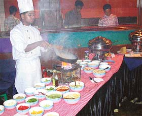 The chef tosses an assortment of pasta and sauces at Cinnamon Roof