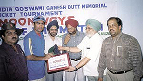 India star Mohd Kaif of ONGC receiving the man of the match award from Khalsa College principal Dr D S Clair in the Goswami Ganesh Dutt Memorial Cricket Tournament at the Khalsa College ground on Wednesday.