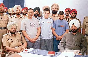 The three accused who were arrested by the Rajpura police in connection with the murder of two taxi drivers