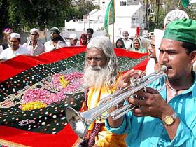 Muslim devotees take out a procession