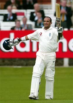 England's Mark Butcher celebrates his century against Zimbabwe on the second day of the first Test match