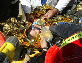 Yousra Hamenniche, a two-and-a-half year old Algerian girl, receives oxygen after being pulled out from the earthquake rubble