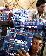 Iraqis buy Pepsi, imported from Kuwait