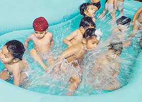 Kids take a splash in the pool to beat the heat in Ludhiana.