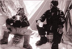 The after-taste of success: Hillary and Tenzing sip a warm brew a day after the conquest
