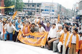 Shiv Sena activists staging a demonstration against hike in power tariff and tuition fee of students