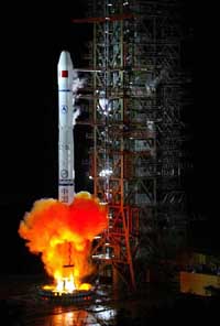 The carrier rocket, 'Long March 3-A,' blasts off from the Xichang Satellite Launching Center