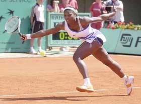 Serena Williams of the USA races to return to Barbara Rittner of Germany