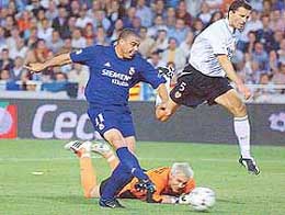 Real Madrids Brazilian striker Ronaldo scores his teams winning goal