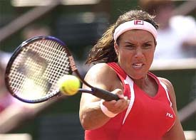 Jennifer Capriati of the US makes a forehand return against South Africas Joanette Kruger