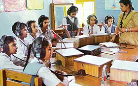 Children use a group hearing aid during classes at Vatika, a school for deaf and dumb children, in Sector 19, Chandigarh, on Thursday.