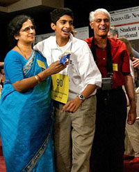 Sai R. Gunturi of Dallas, Texas, is joined onstage by Lakshmi Gunturi and Sarma Gunturi 