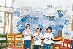 Children of Saupins School in Chandigarh display their projects at a workshop on Saturday.