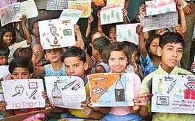 Children say no to drugs through posters during a competition organised by the youth panchayat of the Theatre Age in Sector 30-B, Chandigarh