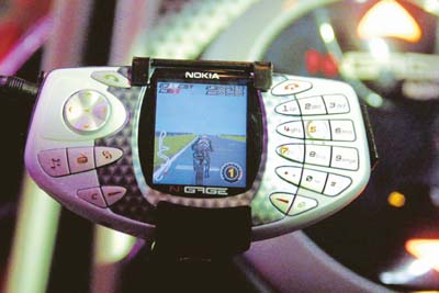 A prototype of the new Nokia mobile game deck, N-Gage is on display at the Electronics Entertainment Expo in Los Angeles.
