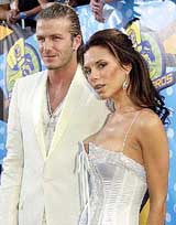 British soccer star David Beckham and his wife