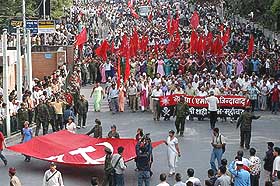 A procession led by leaders of the Nepal Communist Party (UML) passes through Kathmandu on Sunday.