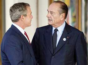 US President with his French counterpart on the terrace of the Royal Parc Evian resort in the French Alps on Sunday.