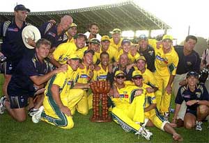 The Australian team poses with the trophy after winning the seven-match one-day international series against the West Indies