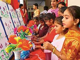Students of Ajit Karam Singh International Public School look at items prepared by them on the concluding day of a summer workshop organised at the school on Wednesday.