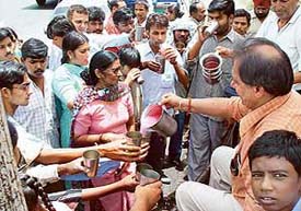 Sweet water being offered to passersby at a chhabeel organised in Sector 20, Chandigarh, on Wednesday.