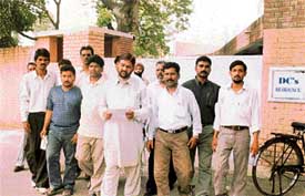Dalit leaders emerge from the Deputy Commissioner’s residence after submitting a memorandum to him regarding the Talhan violence