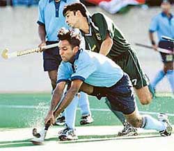 Indian player Gagan Ajit Singh attempts a shot on goal 