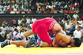 Zeid Vand Pariviz of Iran pins Gurvinder Singh of India on the mat in their 66 kg Greco Roman final bout of the Asian Senior Wrestling Championship 