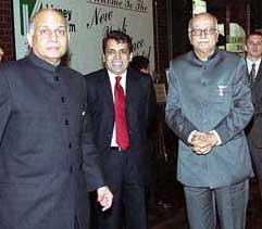 Deputy Prime Minister L.K. Advani with Mr Lalit Mansingh (extreme left) , Indias Ambassador to Washington, on his arrival in New York on Saturday.