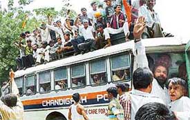 The local MP, Mr Pawan Bansal (extreme right), and the Mayor, Mr Subhash Chawla, being arrested following a Congress protest against the ongoing demolition drive in Chandigarh on Wednesday.