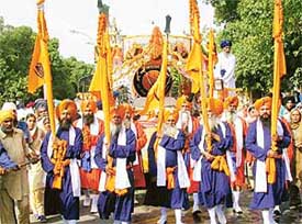 Panj Piyaras lead a nagar kirtan in Chandigarh on Saturday on the occasion of the martyrdom day of Guru Arjan Dev