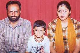 Surinder Kumar with his wife and