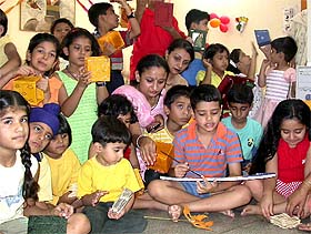 Children learn to make decorative items in a summer workshop at Sector 38 West