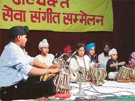 Children show their skill on tabla at a workshop organised by the Avyuqt Kala Seva Society