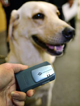 A mobile satellite-based Global Positioning System dog-tracking device was unveiled in Tokyo 