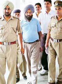 The Head Cashier of Punjab National Bank, Raj Pal Singh, who had run away with Rs 20 lakh of the bank