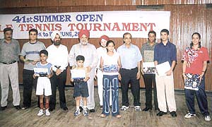 Delhi Table Tennis Association president N S Gujral and organising secretary Hukam Singh with the winners of the Summer Open Table Tennis Tournament
