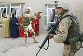 US troops raid a house at Khaldiyah, 70-km west of Baghdad