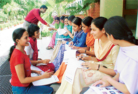 ABVP activists urge admission-seekers at the Government College for Women