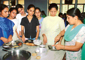 Participants brush up their culinary skills during a summer class on cooking being organised by the Department of Food and Nutrition